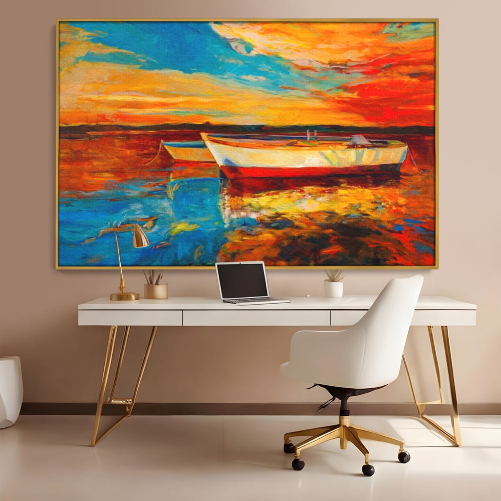 Tablou canvas cu pictura cu barci la apus, in rama de aluminiu auriu, pe perete intr-un birou
